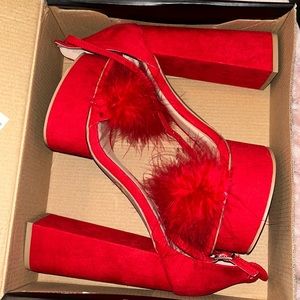 Red heels with fur